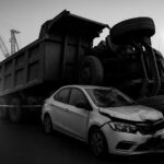 GURUGRAM: One Dead, Two Injured as Gravel Truck Overturns on Cab